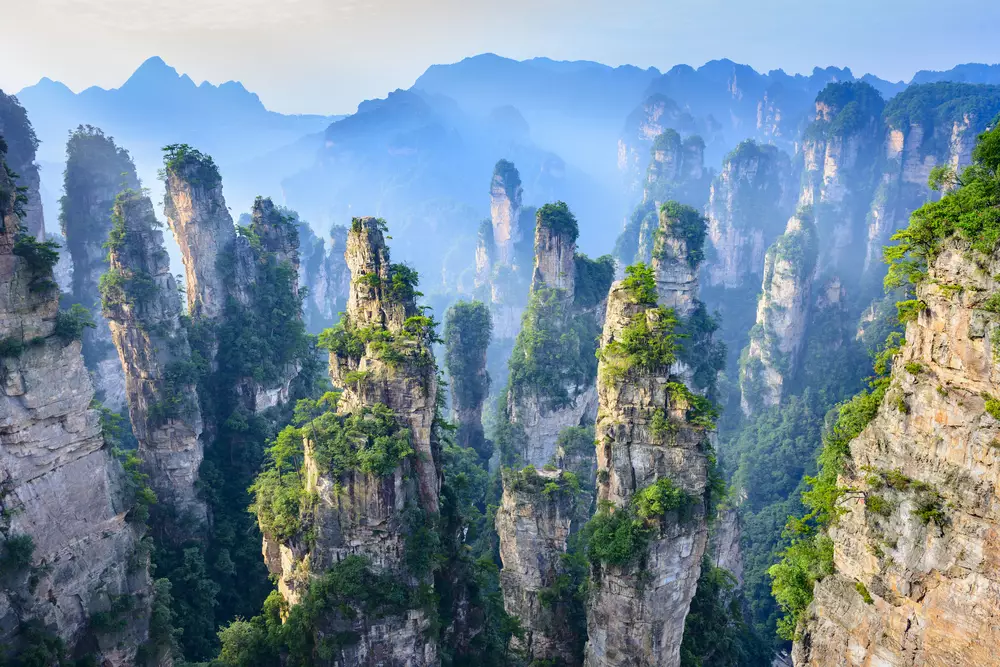 <p>
	Be captivated by the surreal beauty of Zhangjiajie, with its towering sandstone pillars and lush forests, the inspiration for Avatar&rsquo;s floating mountains.</p>
